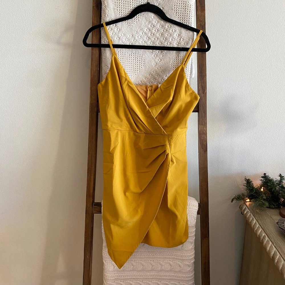 NWOT Blue Blush yellow asymmetrical bodycon mini dress